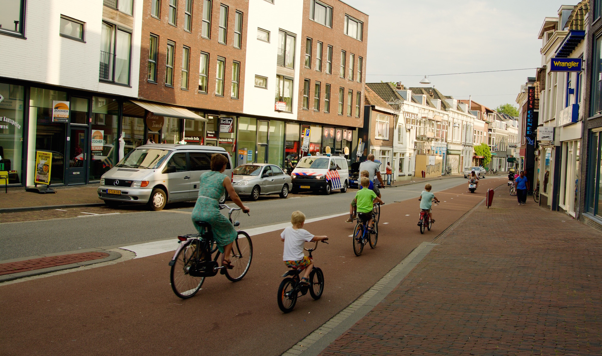 A family cycling out of the centre of Dordrecht.