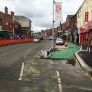 A view of the old and new cycle lanes on the Curry Mile