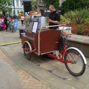 a mobile coffee stand built into a cargo trike